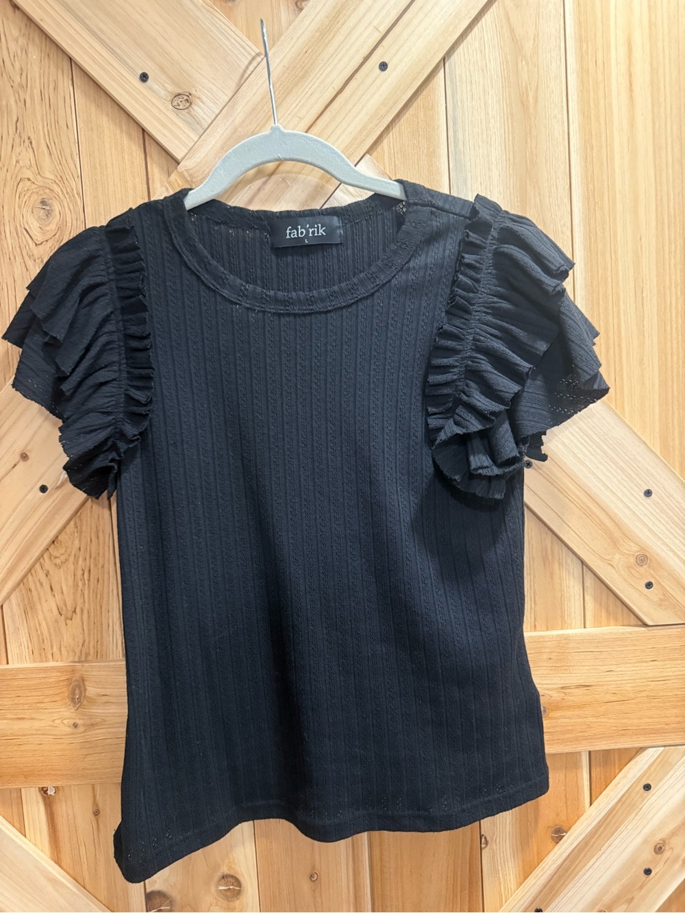 fab'rik Black Ruffle Short Sleeve Knit Top